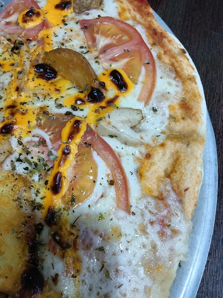 Luis Cruz_Pizzería Beleny's_Estepa_review