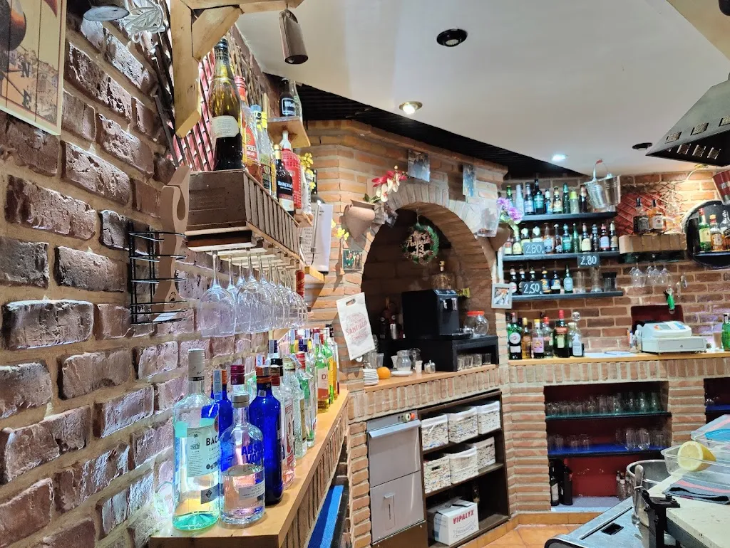 Taberna Travesia 13 restaurant in Torrico