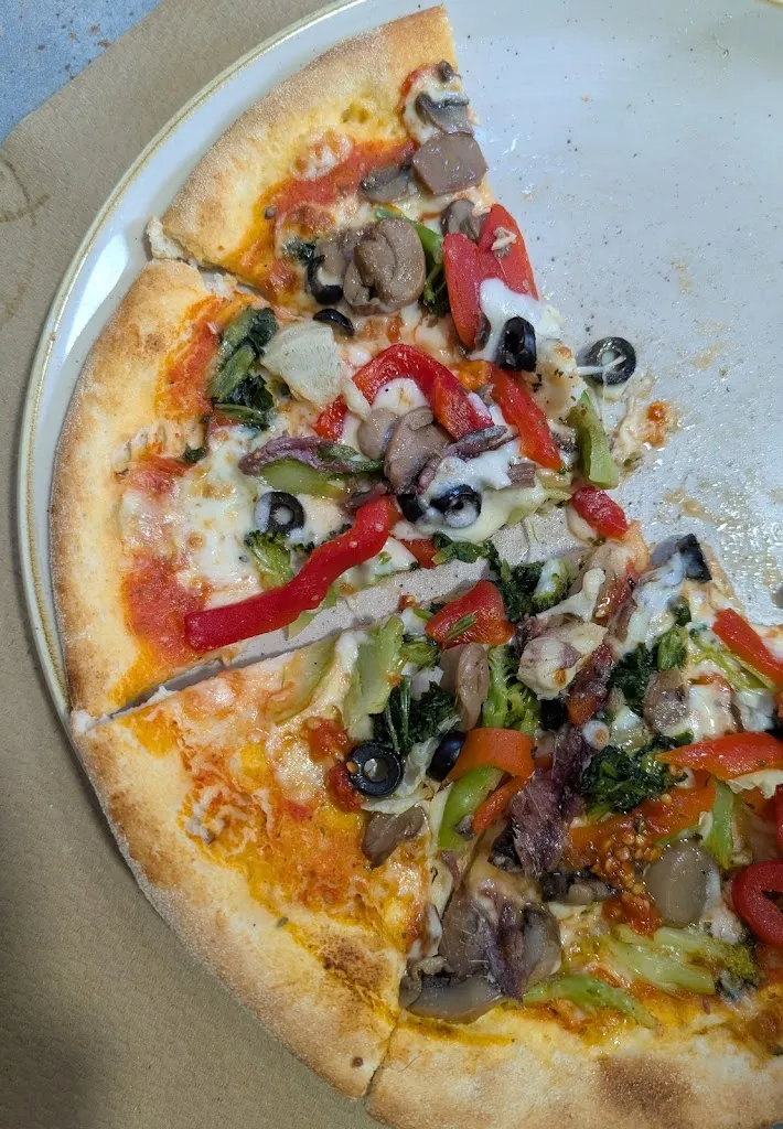 Apoorv Gaur_Restaurante Pizzería Milio_Negreira_recensione