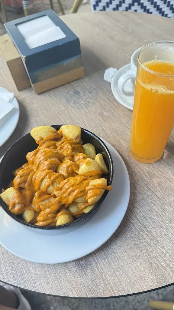 Christine Marie Pogado_Café Europa_Carme_review