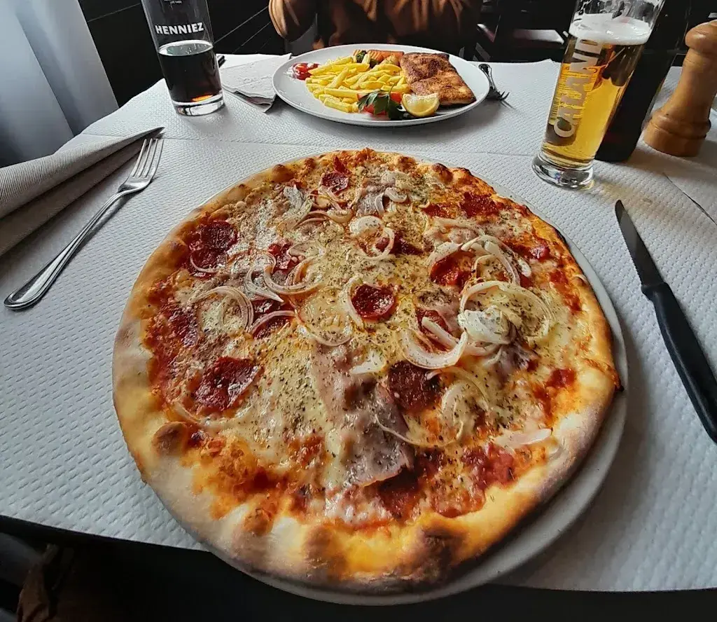 Pierre Marthaler_Restaurant Pizzeria Zentrum_Orpund_avis