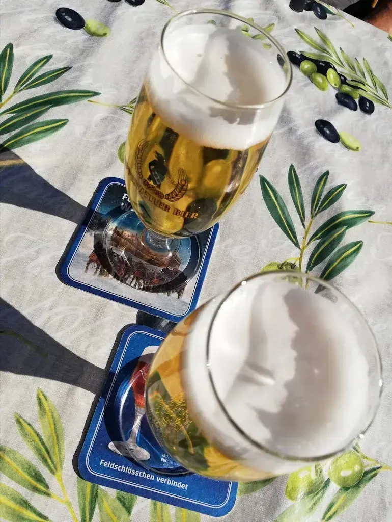 Michel Denitrio_Koi-Gartenteich_Häusernmoos im Emmental_recensione