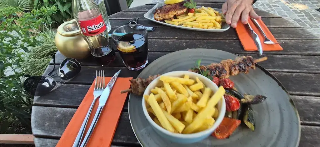 Bruce Guetta_Kunterbunter Rosengarten_Holzhäusern ZG_review