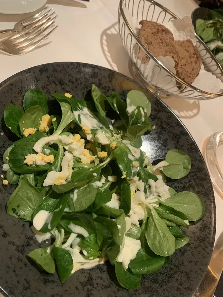 M. Enzo._Pöstli_Rudolfstetten-Friedlisberg_review