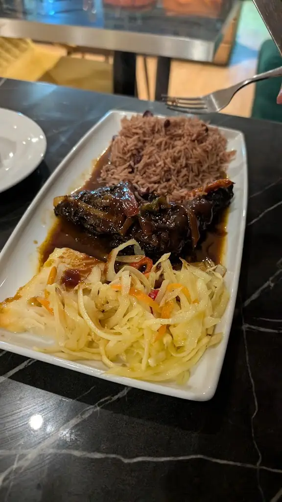 stefan rogers_Comie's Caribbean Grill_Cowley_review