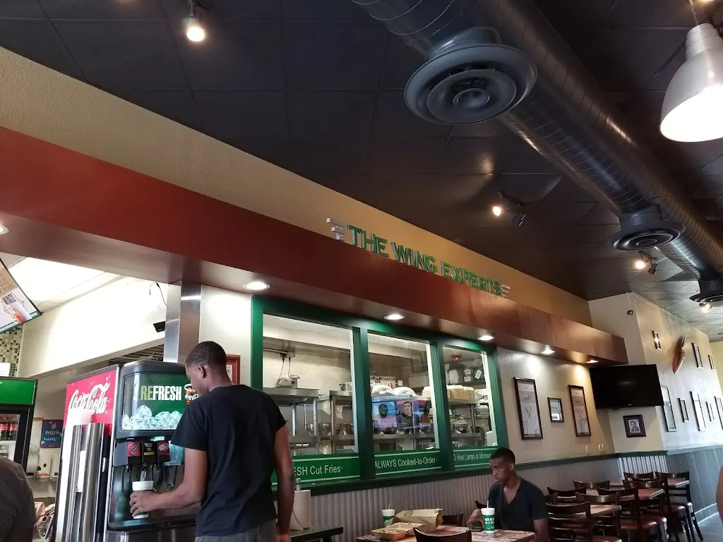 Wingstop restaurant in Normandy, MO